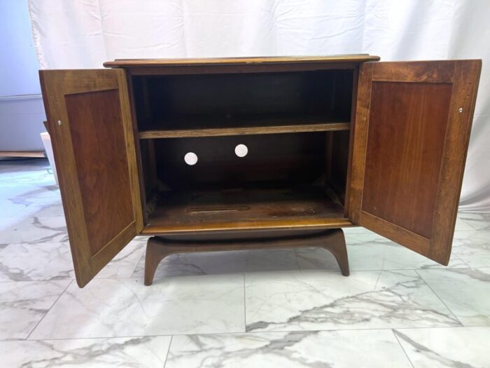 1960s mid century modern swivel cabinet on sculpted legs 0156