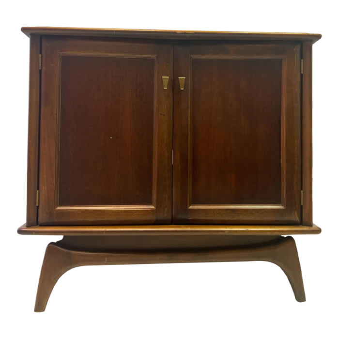 1960s mid century modern swivel cabinet on sculpted legs 1117