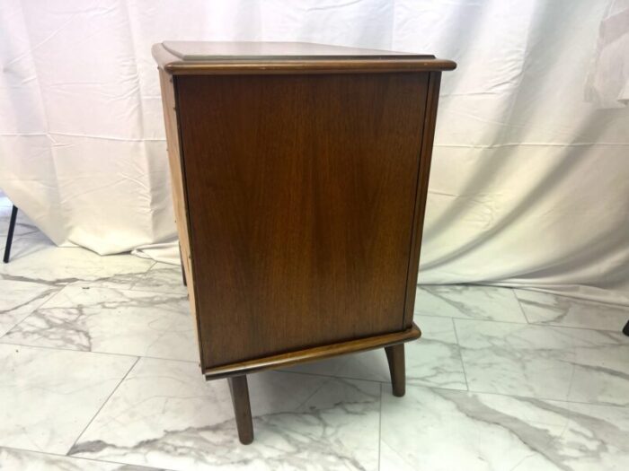 1960s mid century modern swivel cabinet on sculpted legs 4236