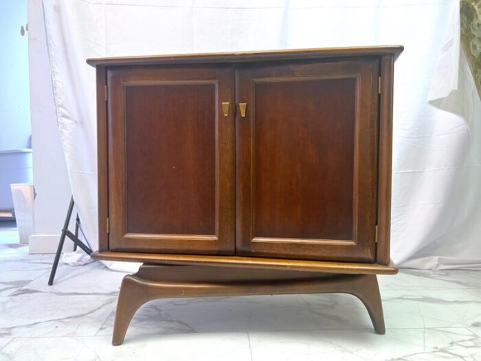 1960s mid century modern swivel cabinet on sculpted legs 4905