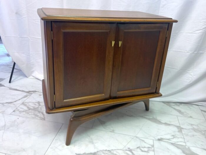 1960s mid century modern swivel cabinet on sculpted legs 8858