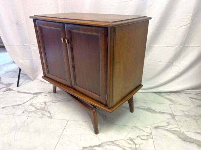 1960s mid century modern swivel cabinet on sculpted legs 9359