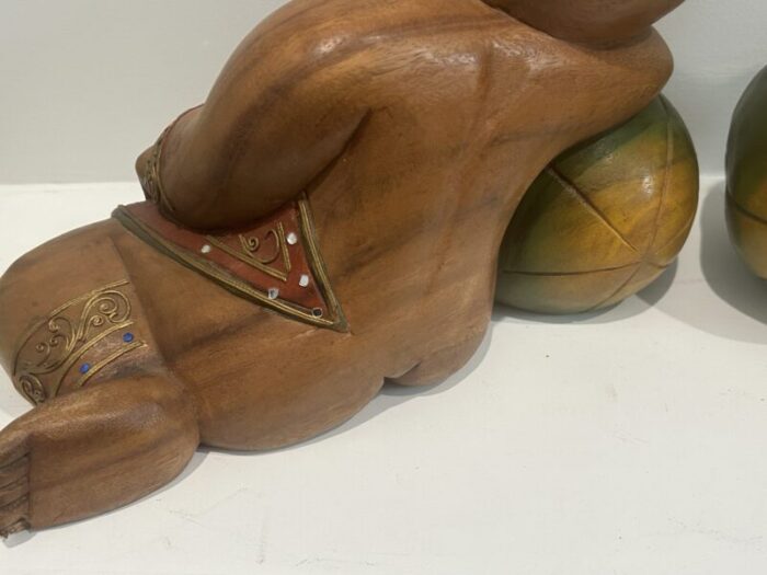 1980s carved and painted asian wood carvings of sleeping children on melons set of 2 0993