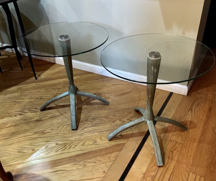 1980s pair of vintage floating glass tables on weathereddistressed metal stands 2115