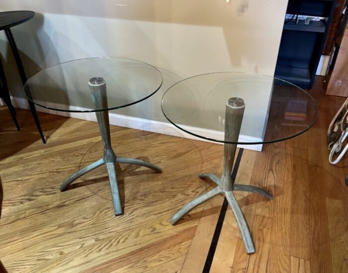 1980s pair of vintage floating glass tables on weathereddistressed metal stands 3167