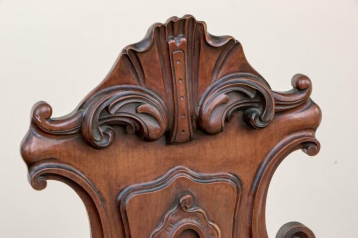 19th century continental cartouche form carved walnut valet hall chairsa pair 0078