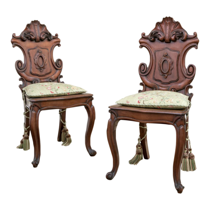 19th century continental cartouche form carved walnut valet hall chairsa pair 0605