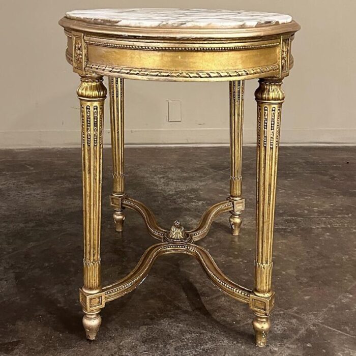 19th century french louis xvi giltwood marble top oval end table 5706