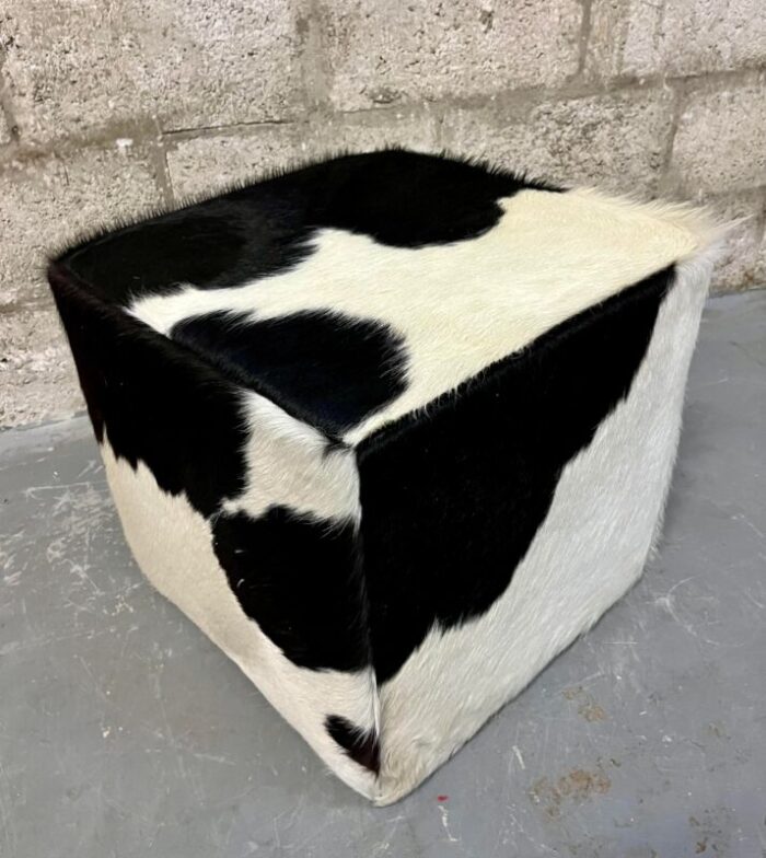 a pair of late 20th century cow hide ottomans footstools 2737