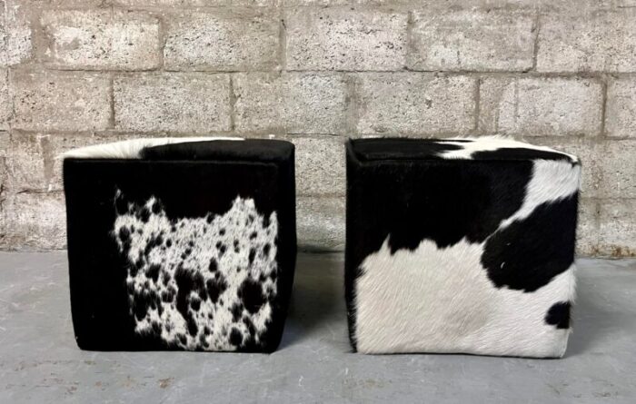 a pair of late 20th century cow hide ottomans footstools 9582