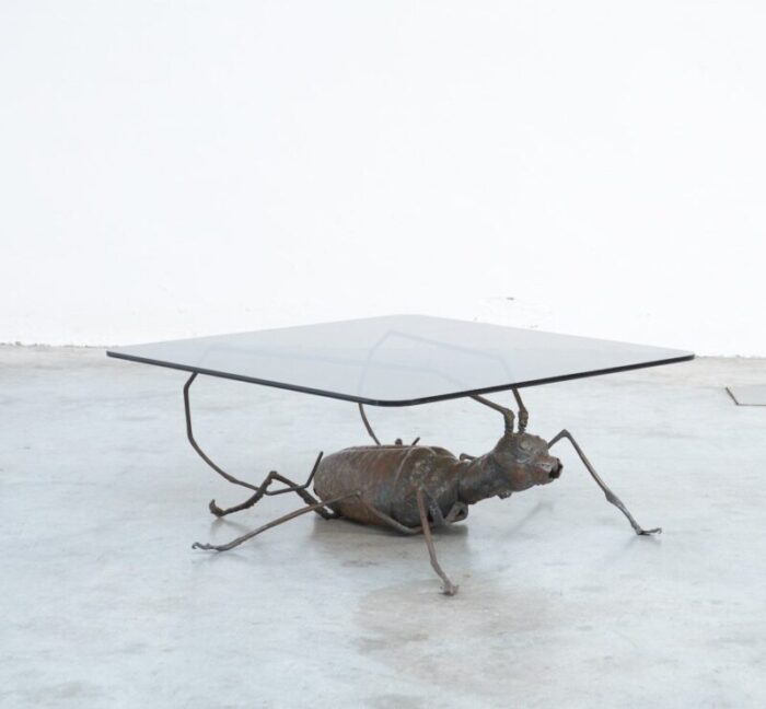 coffee table with a handcrafted metal cricket sculpture base 1970s 10