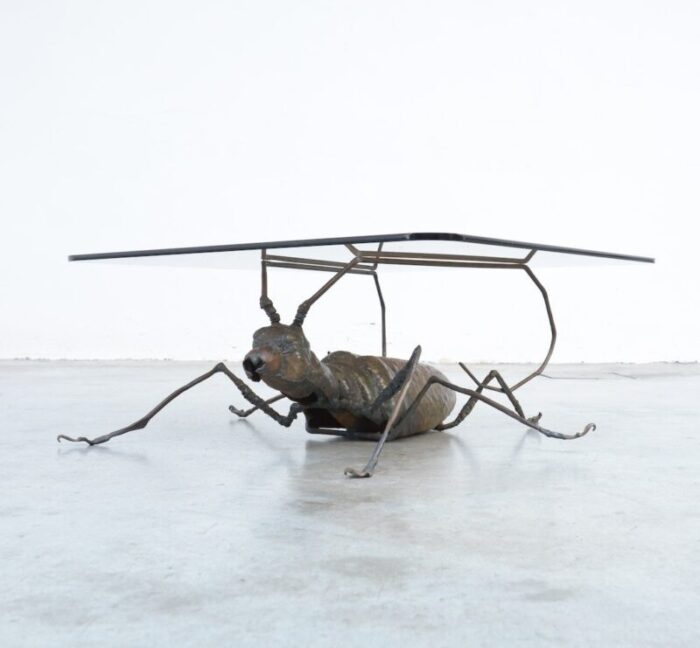 coffee table with a handcrafted metal cricket sculpture base 1970s 12