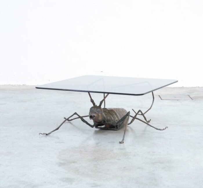 coffee table with a handcrafted metal cricket sculpture base 1970s 14