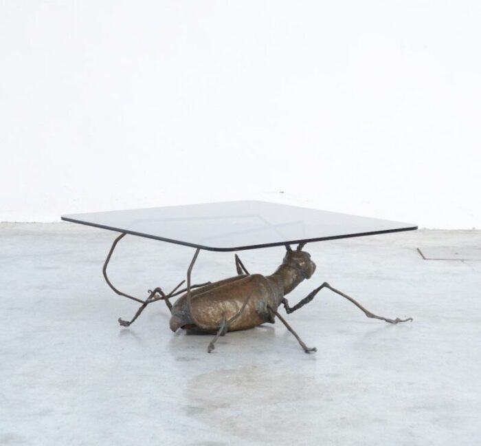 coffee table with a handcrafted metal cricket sculpture base 1970s 4