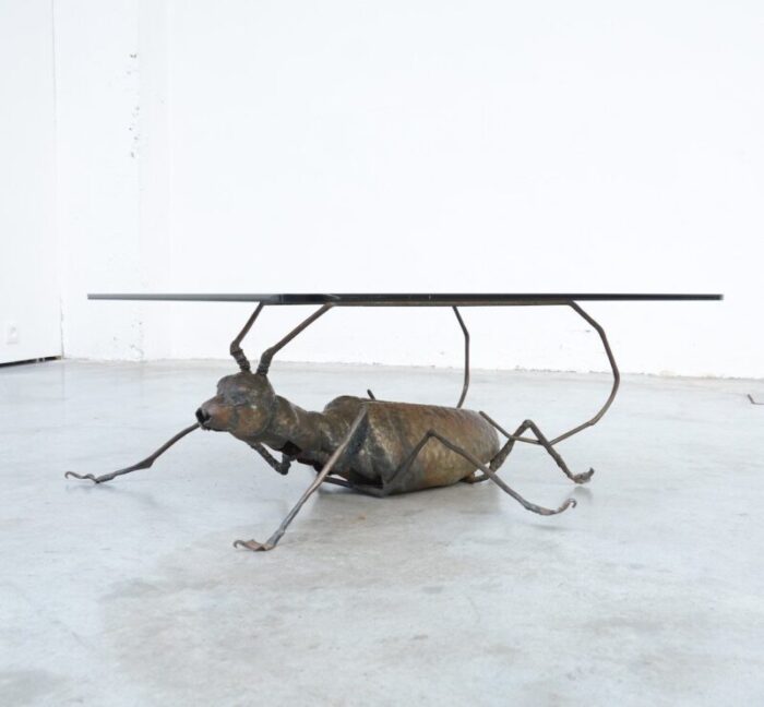 coffee table with a handcrafted metal cricket sculpture base 1970s 7