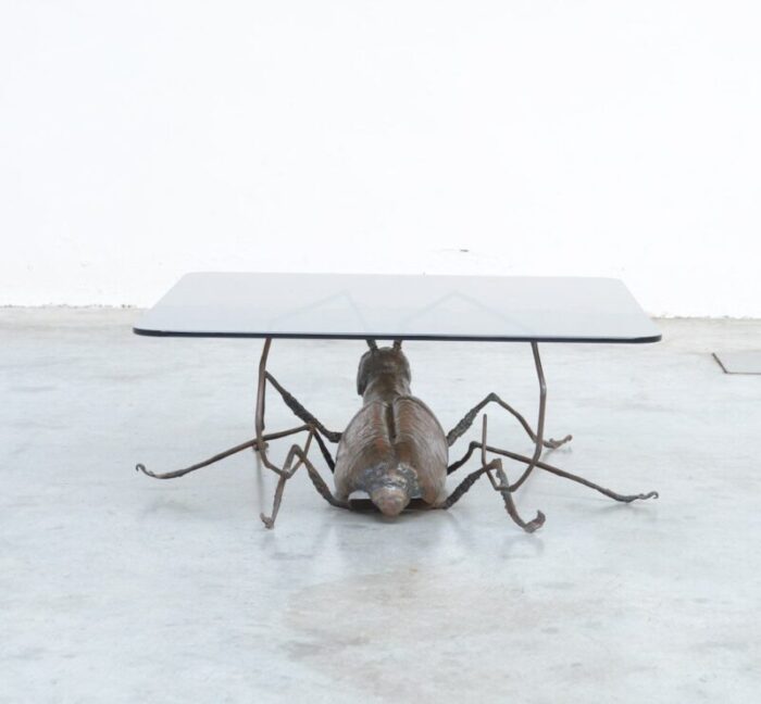 coffee table with a handcrafted metal cricket sculpture base 1970s 8