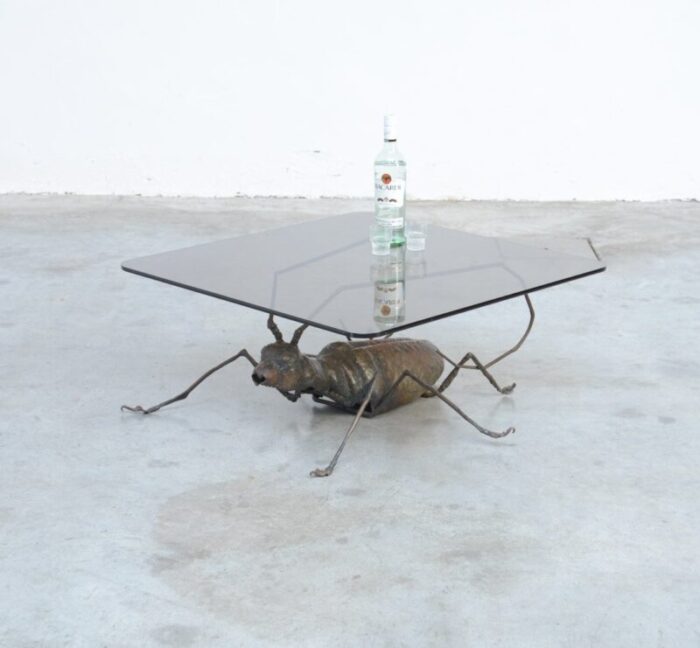 coffee table with a handcrafted metal cricket sculpture base 1970s 9