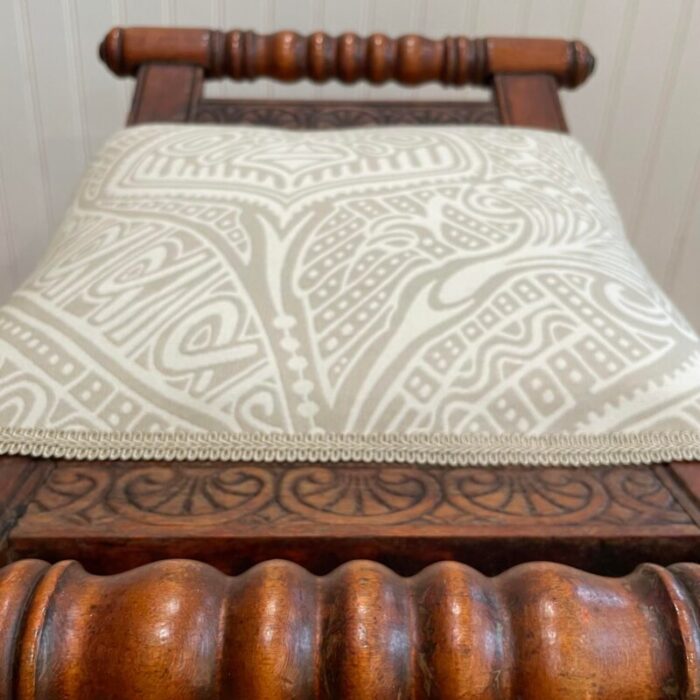 early 20th century traditional victorian spooled footstool with abstract beige upholstery 8049