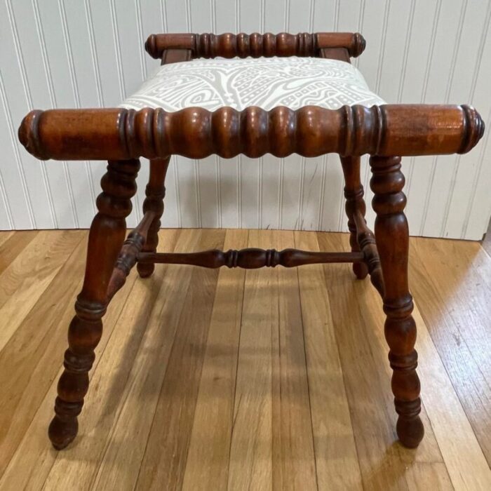 early 20th century traditional victorian spooled footstool with abstract beige upholstery 9663