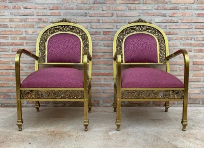 french gold brass bronze armchairs with pink upholstery 1940s set of 2 2