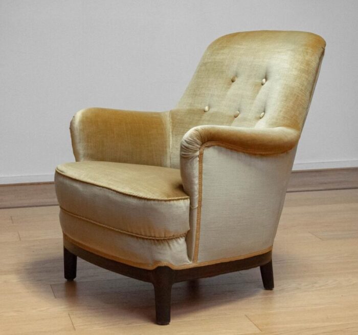 gold colored velvet upholstered lounge chair by carl malmsten sweden 1940s 1017