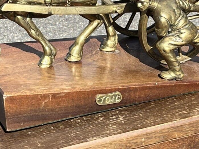 large brass centrepiece of farmer with his horse and cart 6368