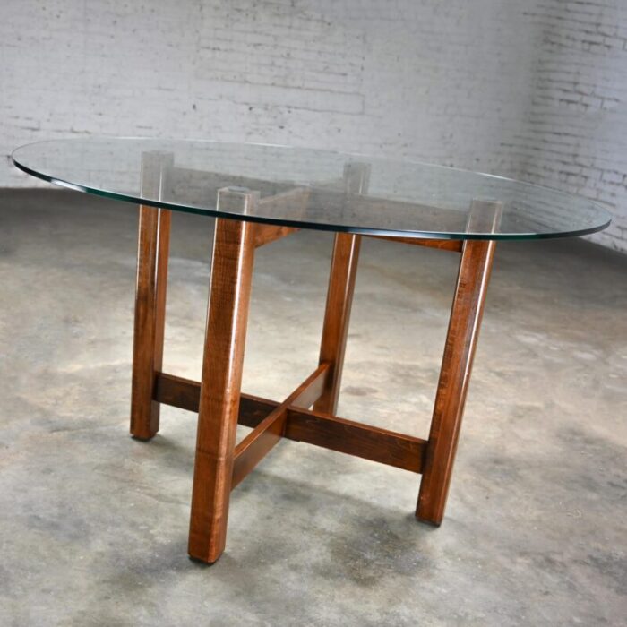 late 20th century modern walnut x base dining room table with round tempered glass top 2399