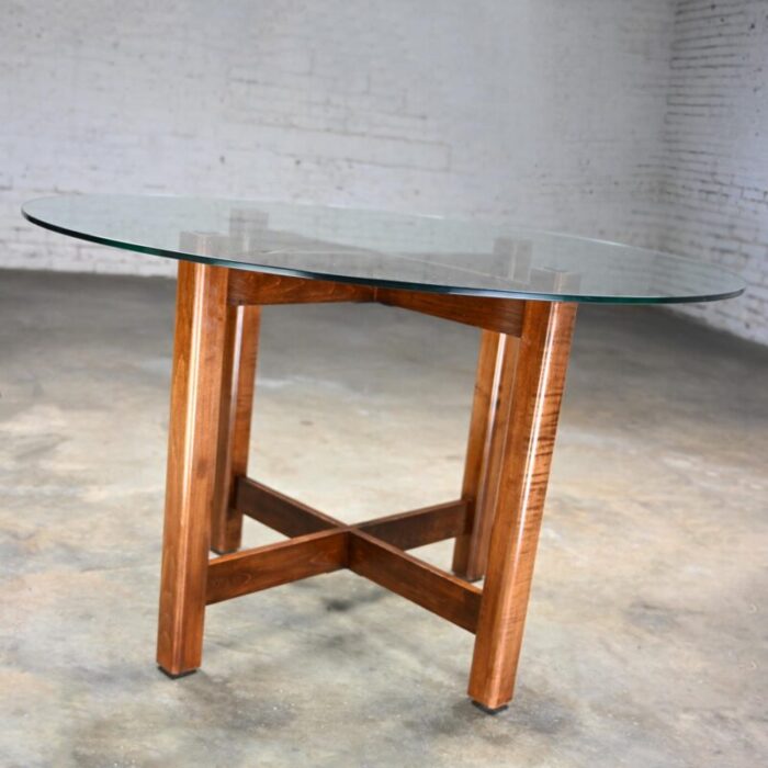 late 20th century modern walnut x base dining room table with round tempered glass top 3491