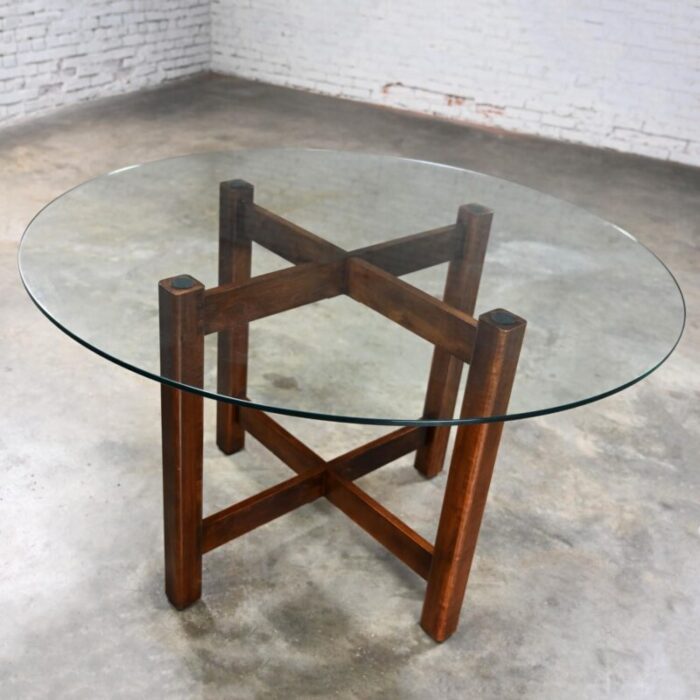 late 20th century modern walnut x base dining room table with round tempered glass top 8334