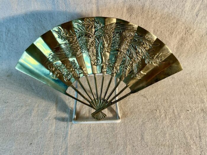 mid 20th century decorative brass wall fan with phoenix imagery 8361