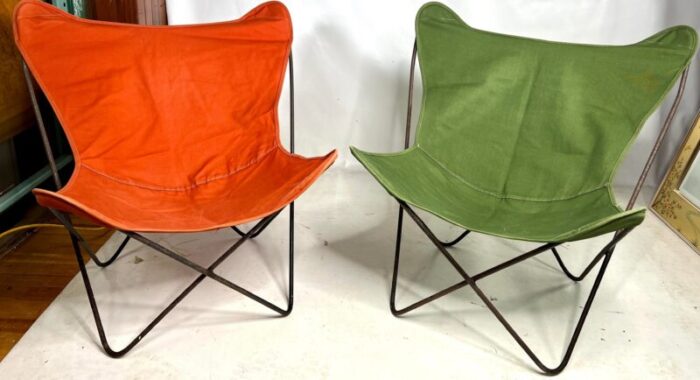 mid century castiron butterfly chairs with canvas slings a pair 3109