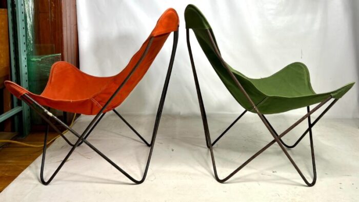 mid century castiron butterfly chairs with canvas slings a pair 4751