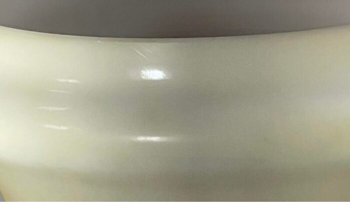 milk glass urn with a porcelain like finish and detailed hand painted floral designs circa 1900 5653