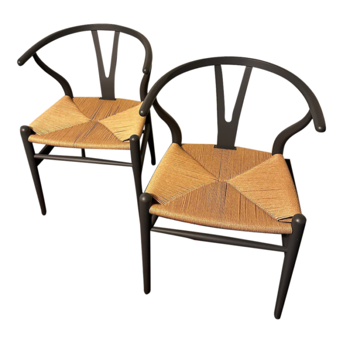 pair of hans wegner wishbone chairs 9501