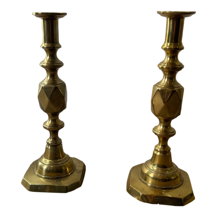 pair of mid 19th century brass diamond pattern good luck candlesticks 3549