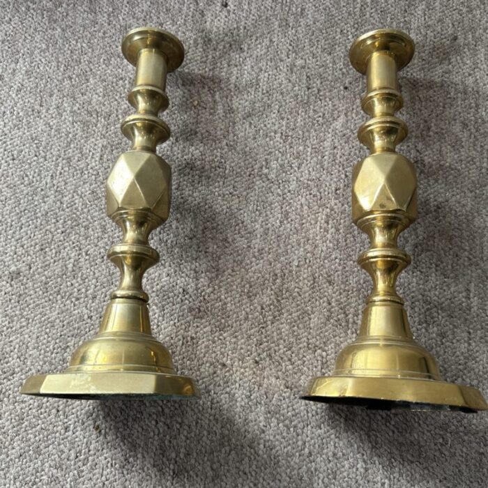 pair of mid 19th century brass diamond pattern good luck candlesticks 9702