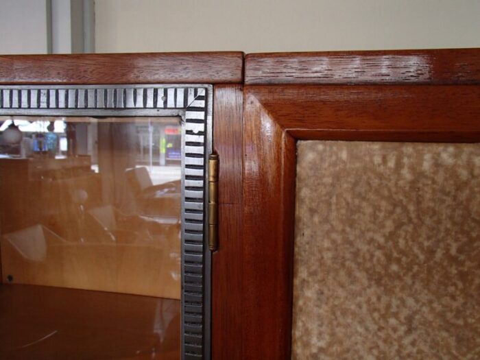 rosewood cabinet with showcase framed in wrought iron doors with raylike plastic cover 1930s 7