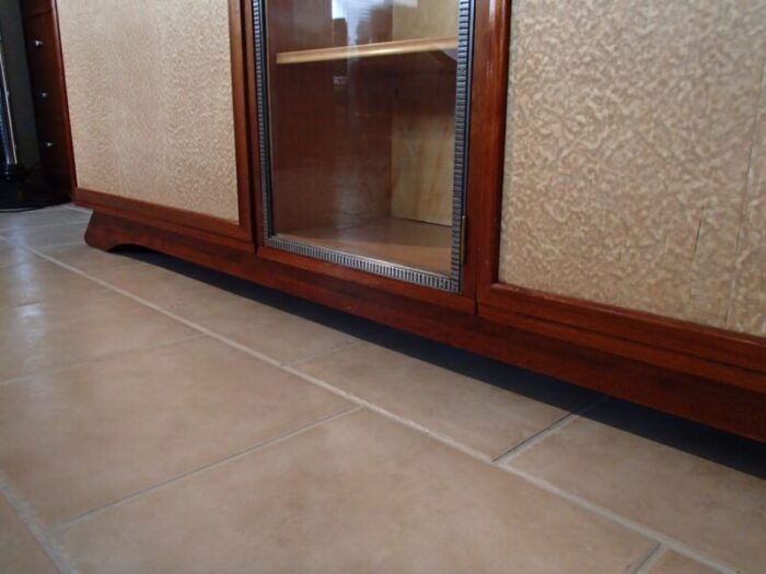 rosewood cabinet with showcase framed in wrought iron doors with raylike plastic cover 1930s 8