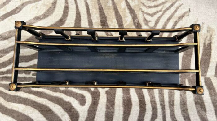 vintage regency style ebony textured and gilt wood canterbury magazine rack in the style of maitland smith 6047